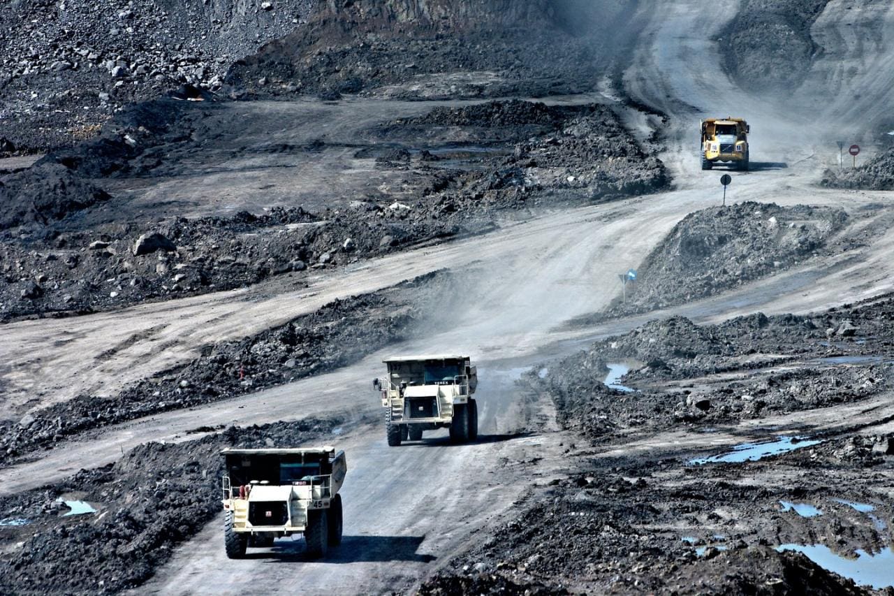 trucks in a coal mine in Indonesia